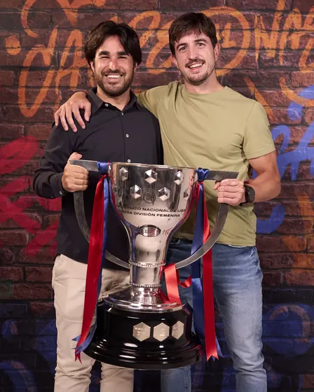 Fran Herruzo y Pere Romeu con un trofeo